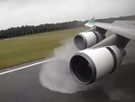 Airliner Landing On A Very Wet Runway
