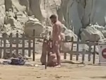 Unashamedly Sucking Dick On The Beach
