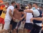 Brawl Breaks Out As Police Try To Clear Beachgoers In Belgium
