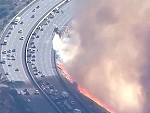 California Fire Comes Right Up To The Freeway
