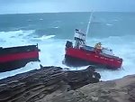 Cargo Ship Smashed Against Rocks After Breaking Its Mooring
