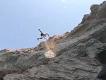 Cliff Gives Way During A Backflip
