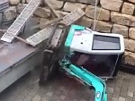 Demonstrates How Not To Load An Excavator
