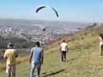 Dog Latches Onto A Paraglider
