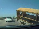 Encounters A Piece Of Furniture On The Highway
