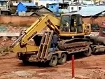 Excavator Loading Like A Boss But Look Who's Driving

