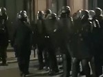 French Riot Cop Attacks One Of His Colleagues
