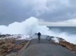 Cyclist Gets A Wave
