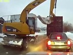 Good Guy Excavator Helps A Truck Blocking The Road
