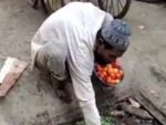 Just Washing His Vege's On The Way To Market
