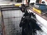 Mechanic Taking A Shower
