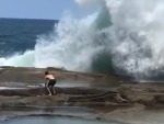 Moron Tries To Take On A Wave
