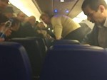 Passengers Remarkably Calm During A Plane Cabin Fire
