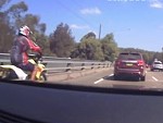Rider Comes Off Second Best Messing With An SUV
