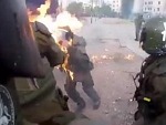 Riot Cops Cop A Molotov

