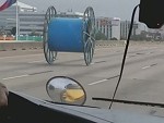 Someone Somehow Lost A Cable Drum On The Freeway
