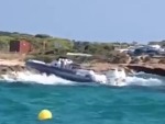 Stricken Boat Takes A Pummelling On The Rocks
