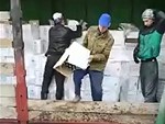 Workers Destroying Bootleg Vodka
